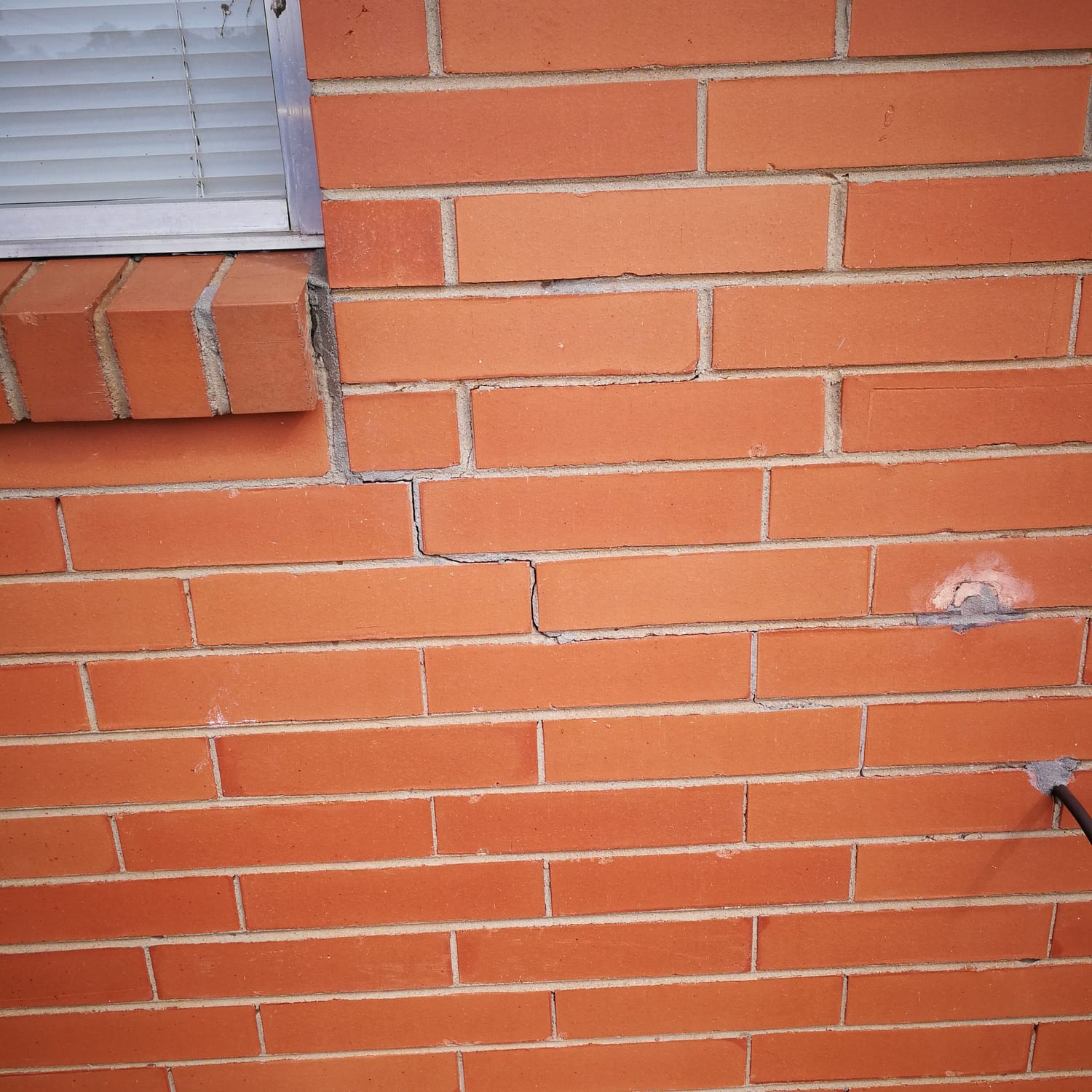 why do walls crack